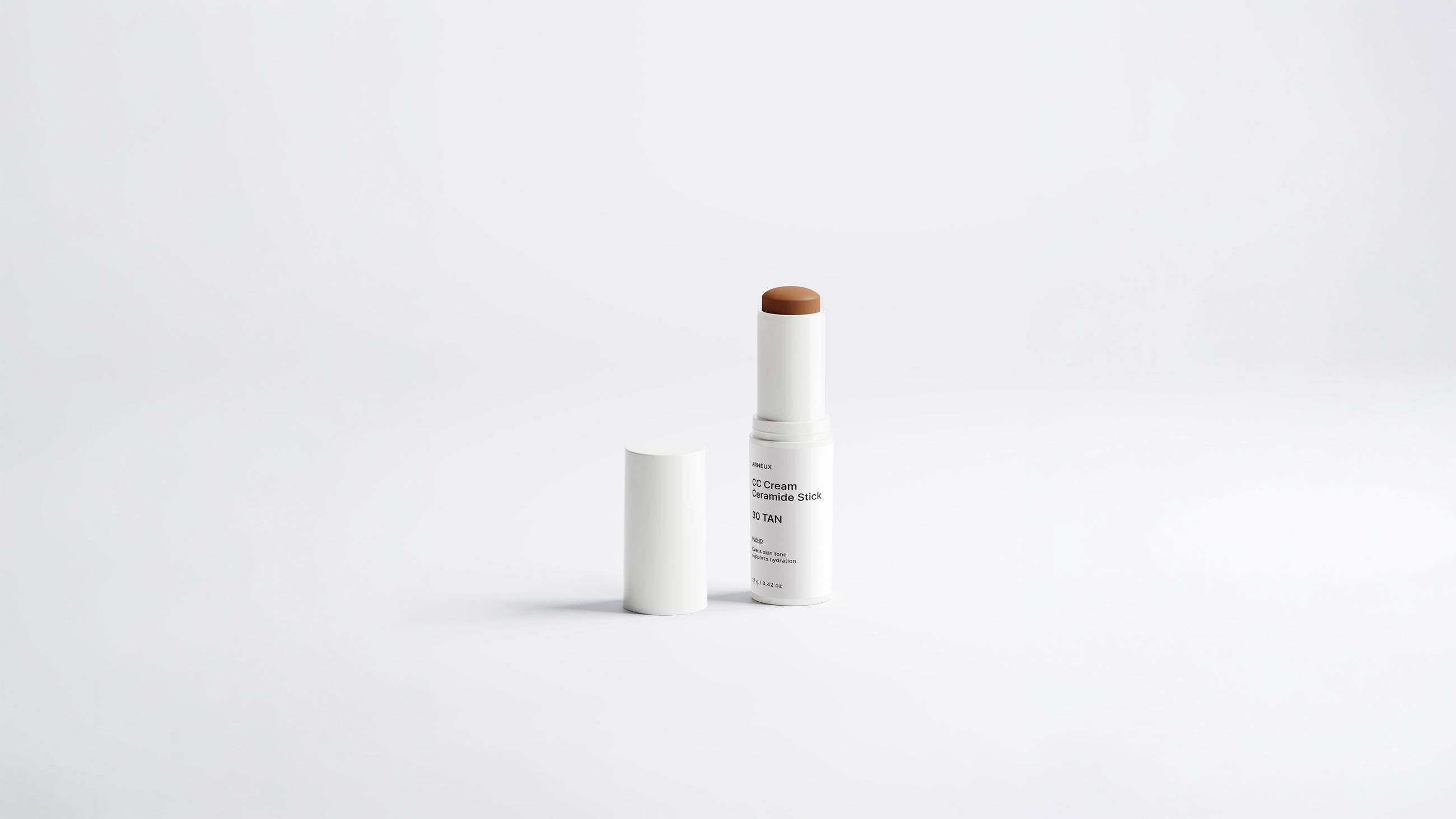BLEND CC cream ceramide stick shade 30 Tan uncapped on white