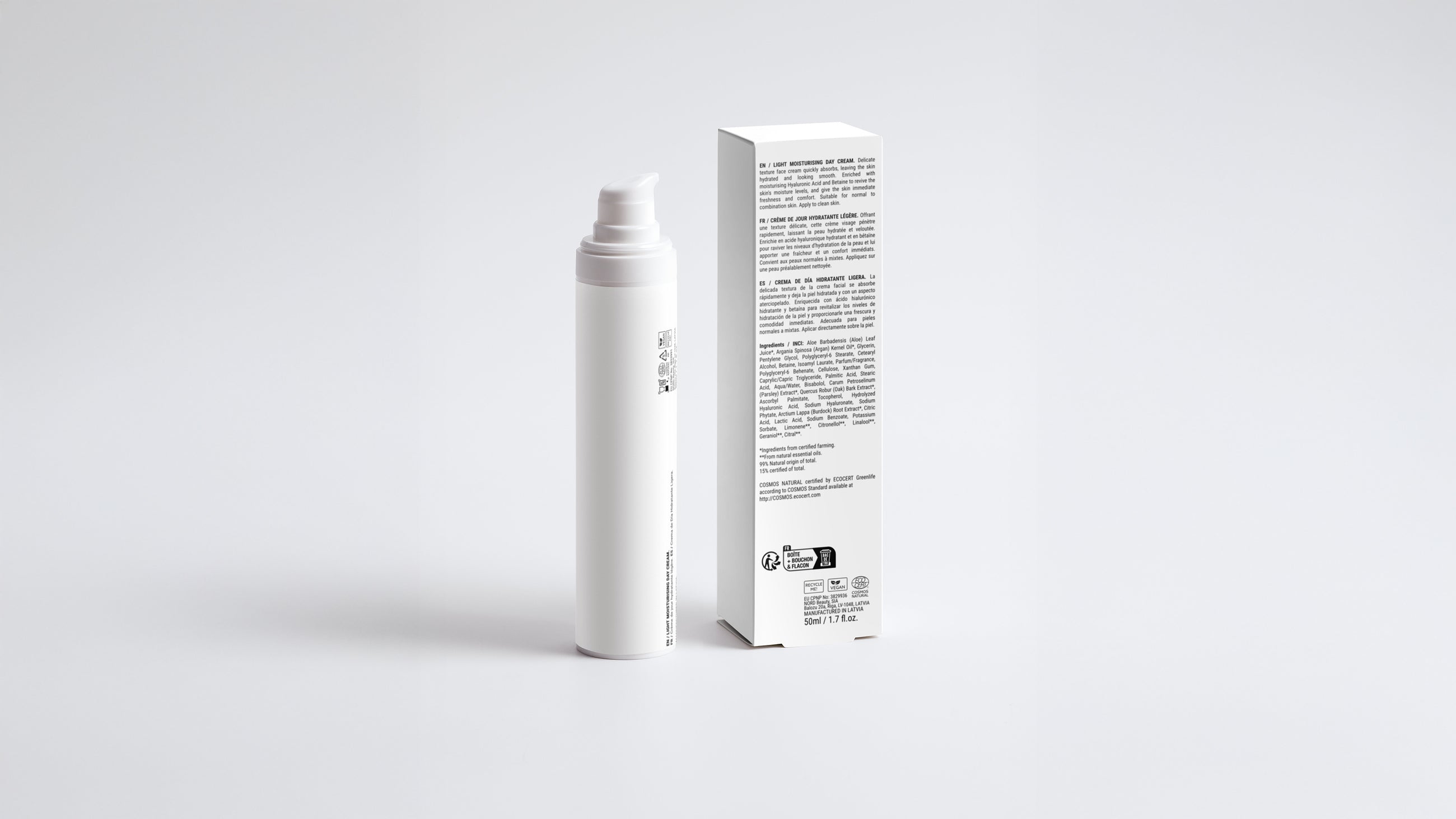 DAY moisturizing light cream bottle beside box back panel showing full ingredient list
