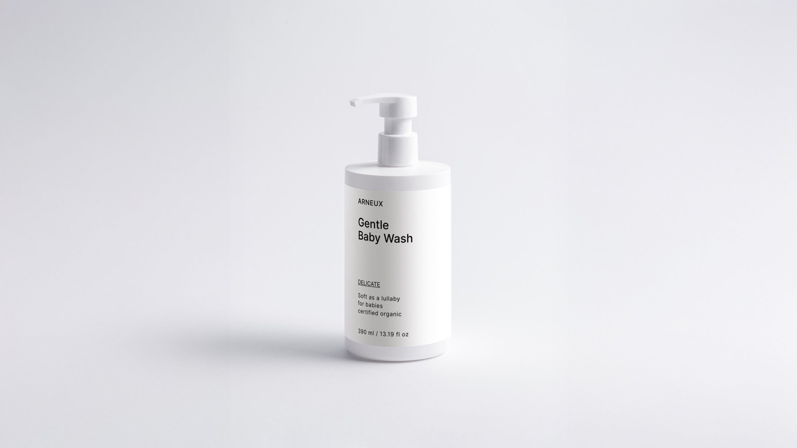 Arneux DELICATE gentle baby wash pump bottle, front label view on light grey background