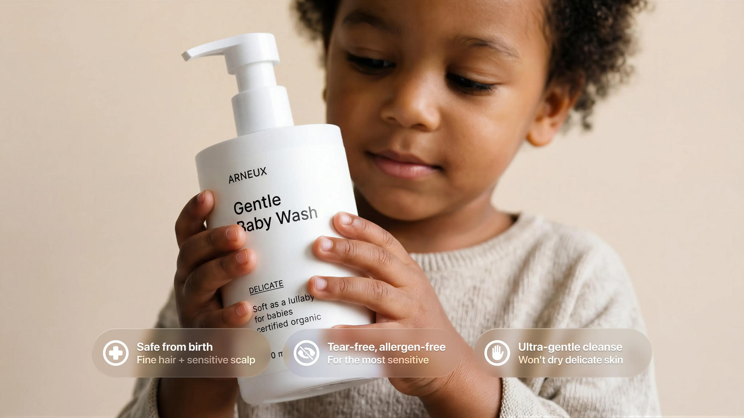 Young toddler holding DELICATE baby wash, safe from birth tear-free allergen-free ultra-gentle cleanse callouts
