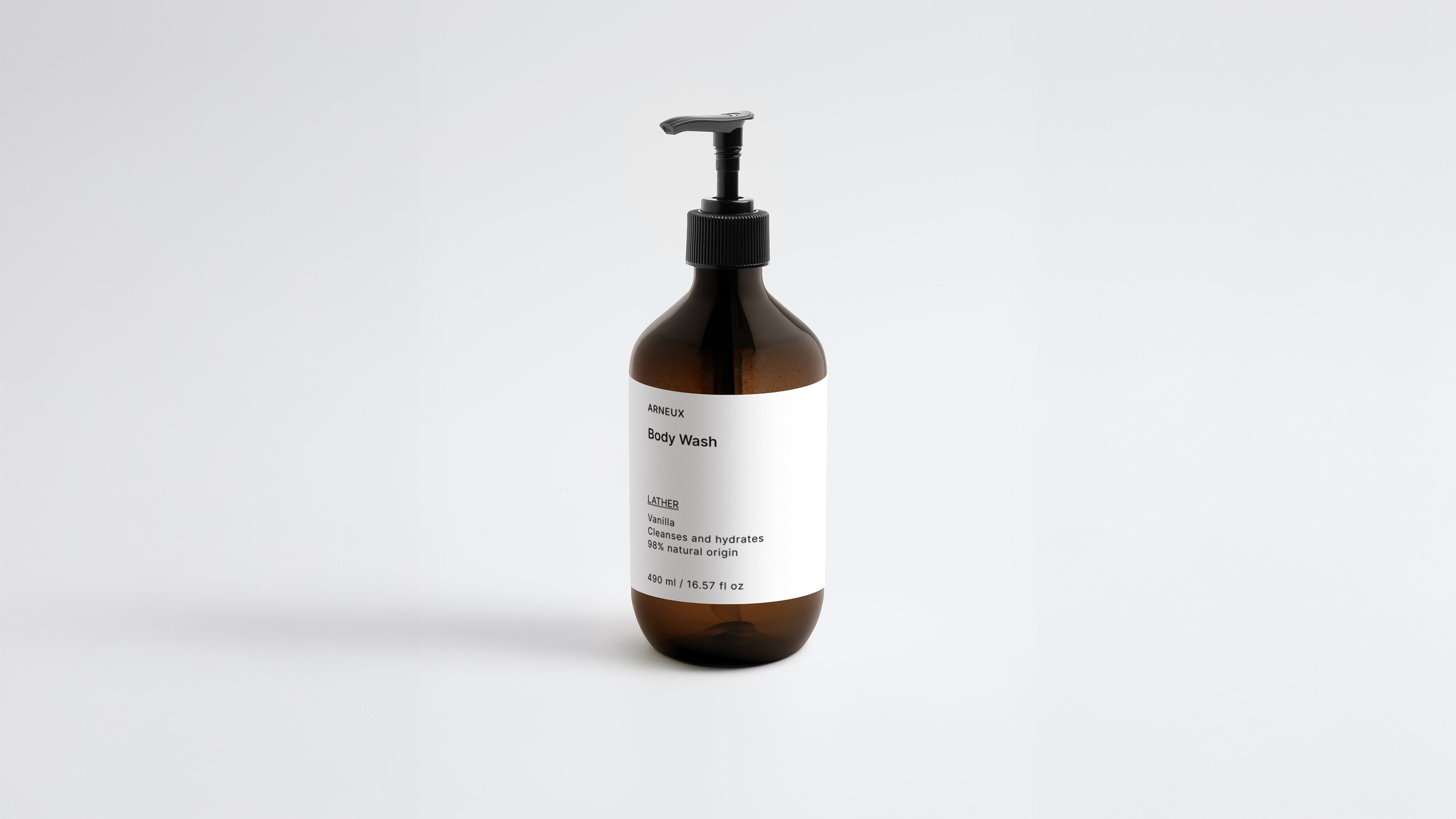 LATHER body wash amber pump bottle clean studio front view on white background