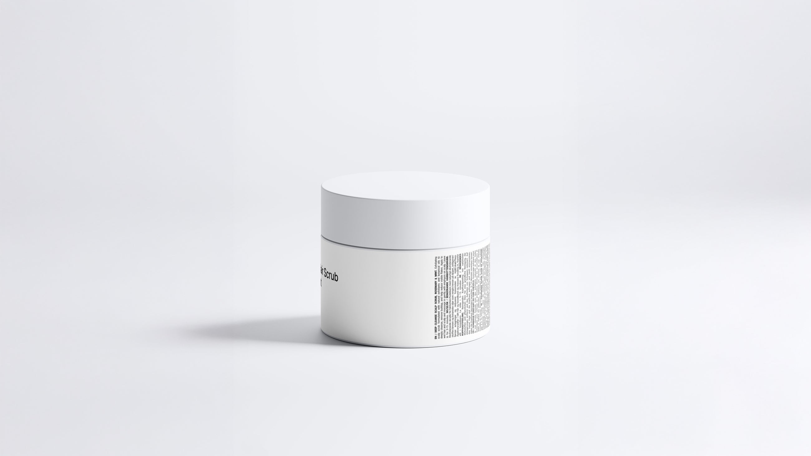 RESET deep cleanse hair scrub jar side view showing back label text on grey background
