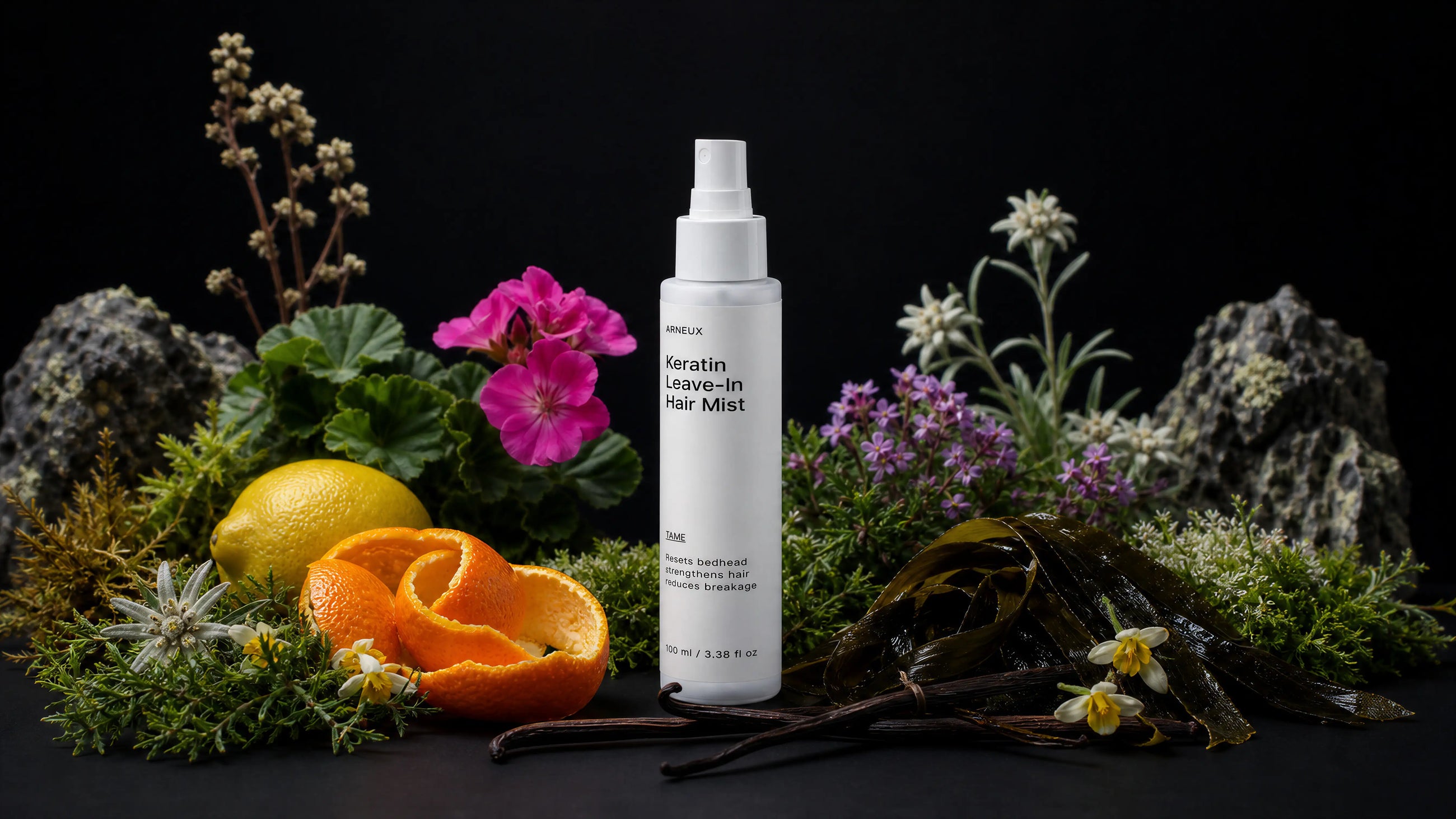 TAME hair mist bottle with edelweiss, orange peel, lemon, vanilla pods and sea algae on black