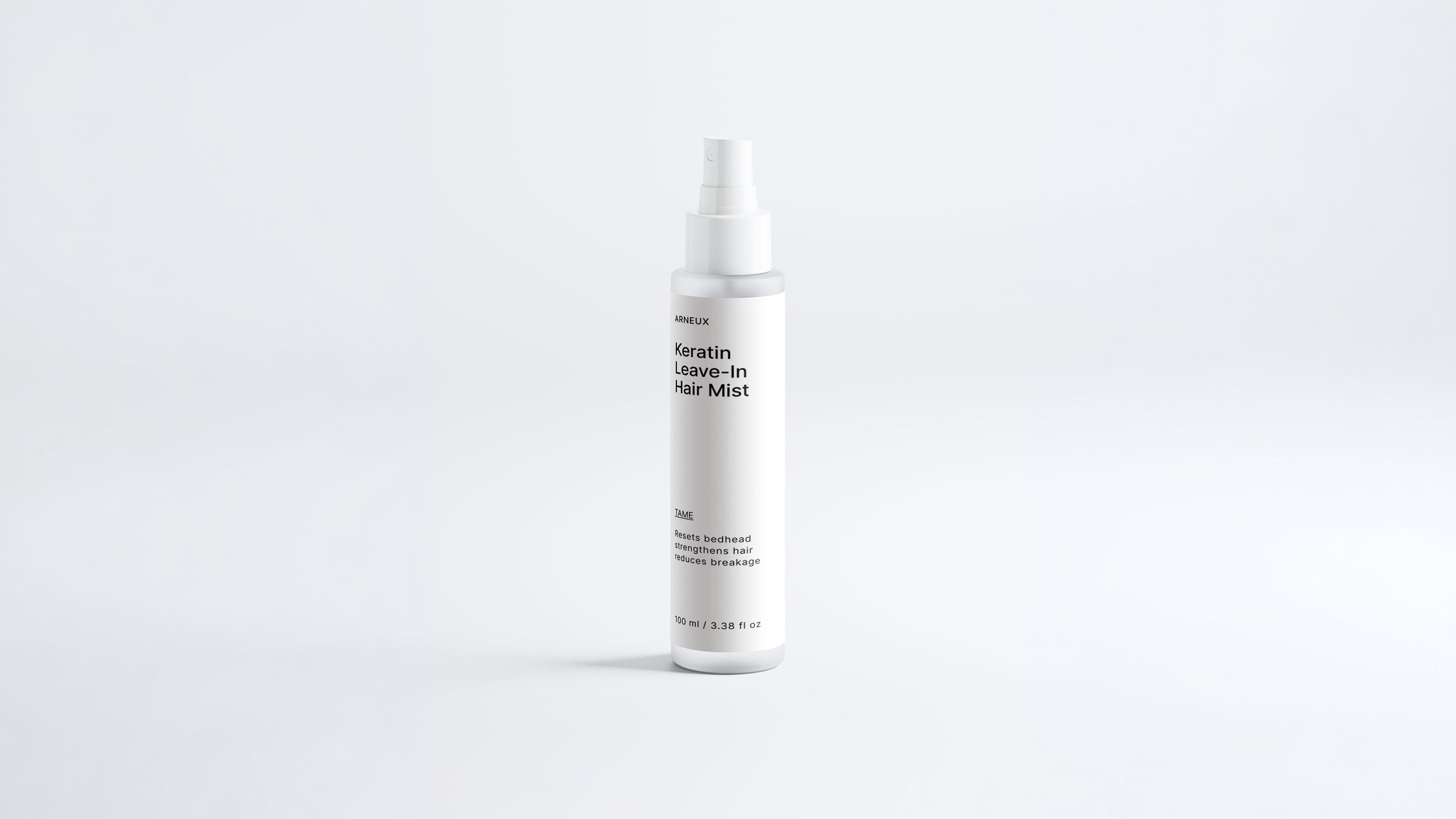 Arneux TAME keratin leave-in hair mist spray bottle, front label on white background
