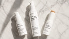 ARNEUX BALANCE organic hyperpigmentation routine on marble surface, kojic acid treatment, COSMOS certified