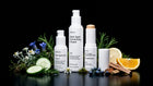 ARNEUX BALANCE hyperpigmentation routine with botanical ingredients on dark background