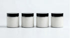 ARNEUX ILLUMINATE natural soy wax travel candles, Lavender, Wild Flower, Ember and Moss on white background