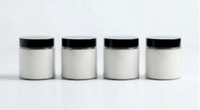 ARNEUX ILLUMINATE natural soy wax travel candles, Lavender, Wild Flower, Ember and Moss on white background