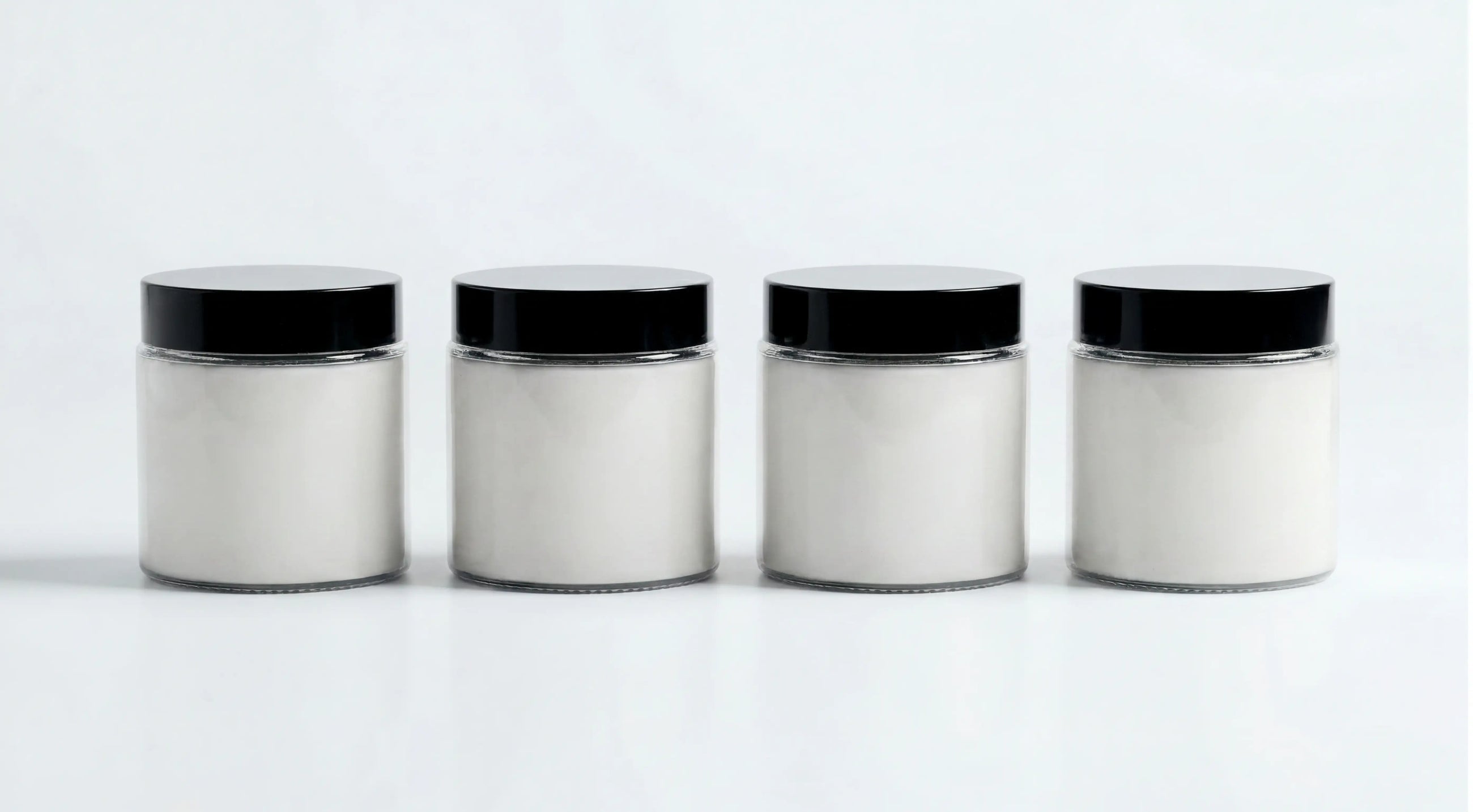 ARNEUX ILLUMINATE natural soy wax travel candles, Lavender, Wild Flower, Ember and Moss on white background