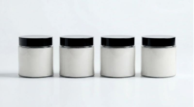 ARNEUX ILLUMINATE natural soy wax travel candles, Lavender, Wild Flower, Ember and Moss on white background