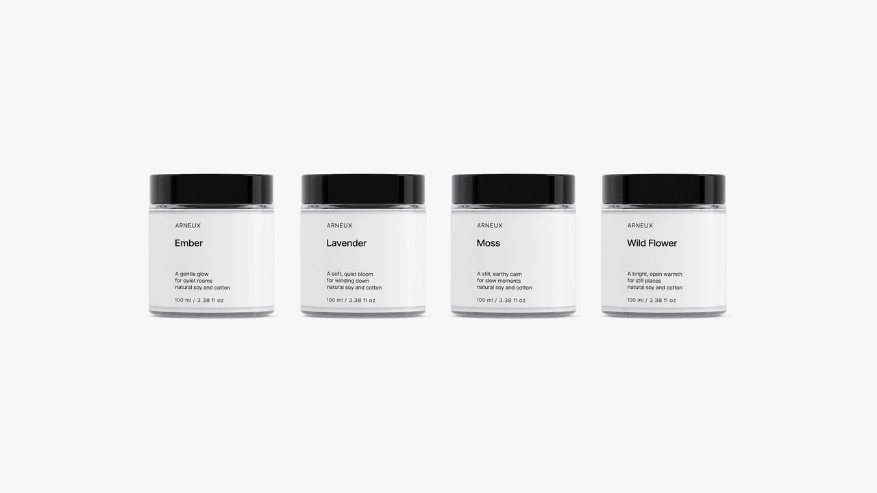 ILLUMINATE Travel Candle Set by ARNEUX, four natural soy wax candles in Ember, Lavender, Moss and Wild Flower