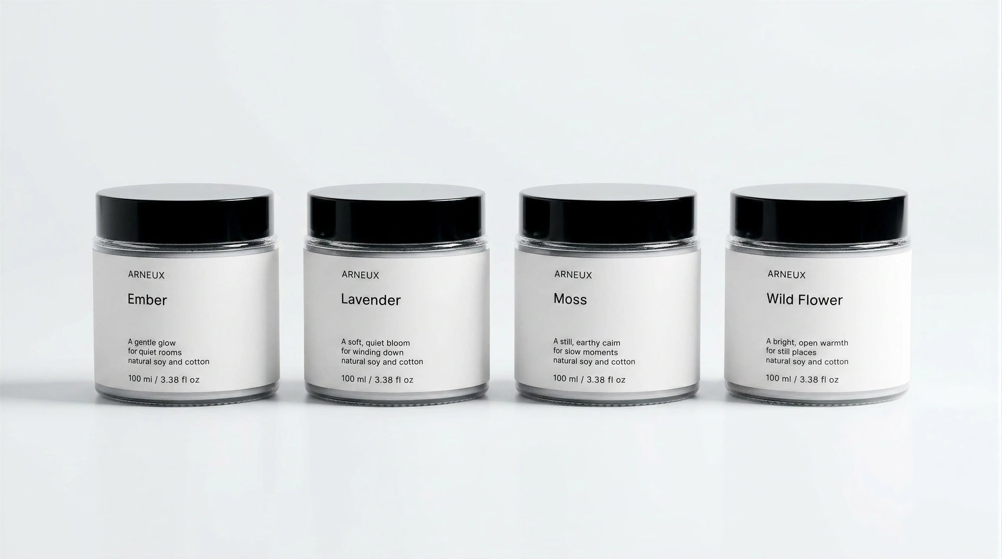 ILLUMINATE Travel Candle Set by ARNEUX, four natural soy wax candles in Ember, Lavender, Moss and Wild Flower