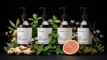 ARNEUX INDULGE body wash set with grapefruit and botanical ingredients on dark background