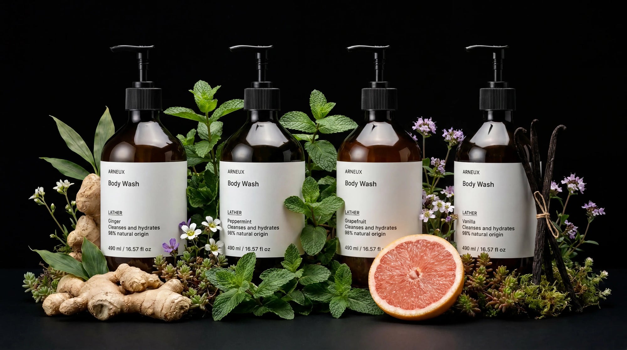 ARNEUX INDULGE body wash set with grapefruit and botanical ingredients on dark background