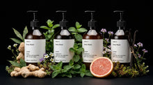 ARNEUX INDULGE body wash set with grapefruit and botanical ingredients on dark background