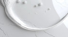 Sulfate-free organic body wash lather close-up from ARNEUX INDULGE shower routine