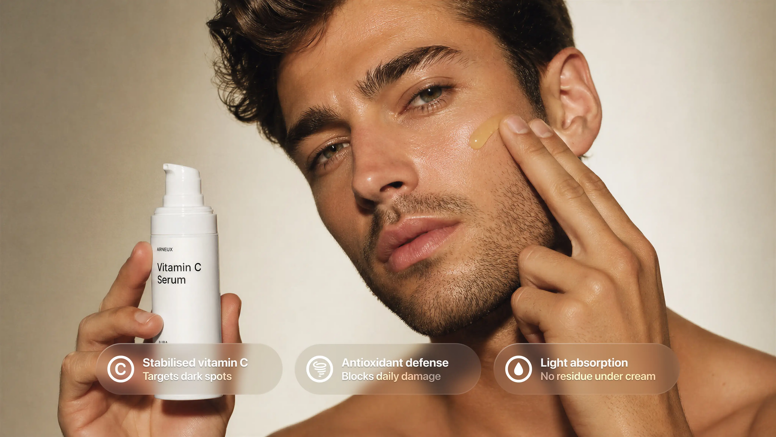 Man tapping AURA vitamin C serum to cheek, stabilized vitamin C antioxidant defense light absorption callouts