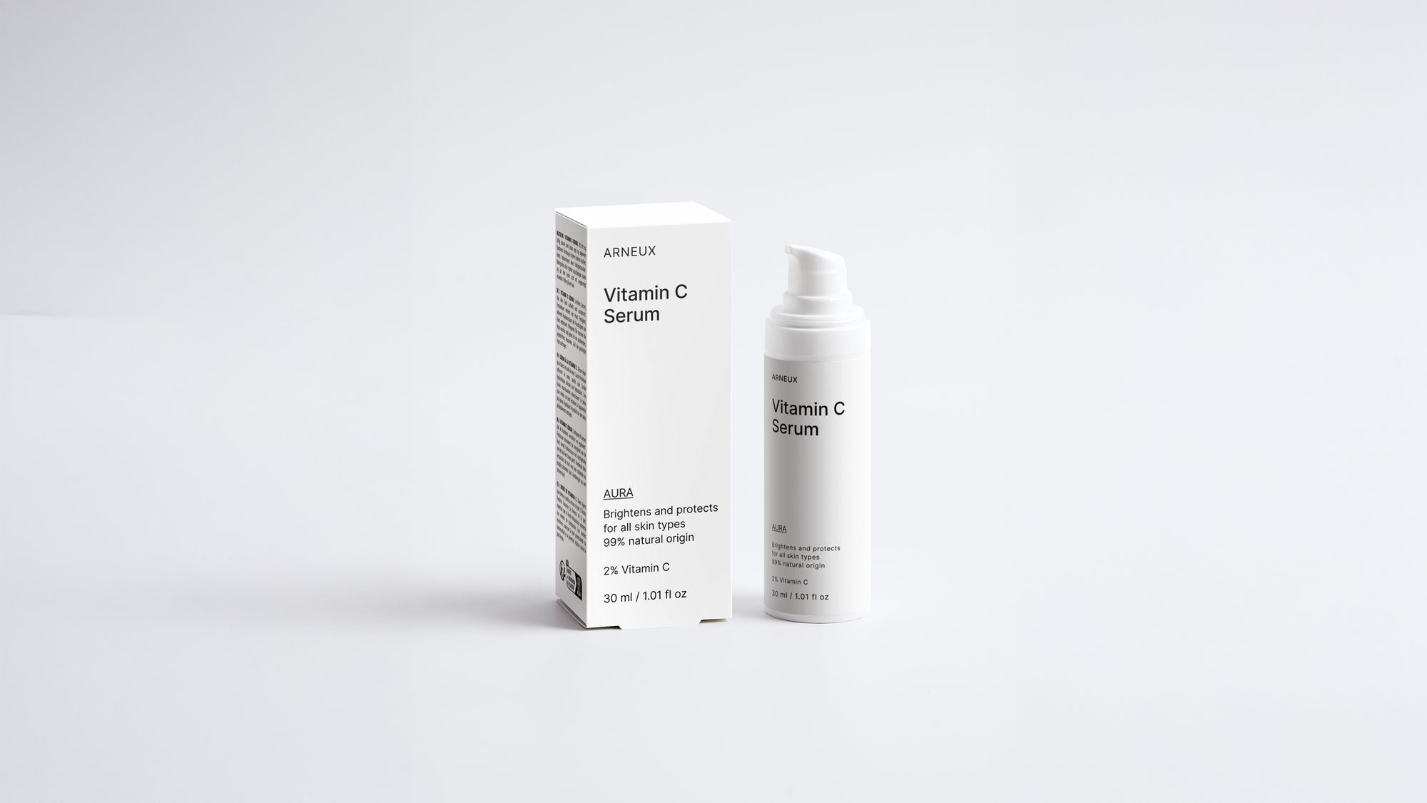AURA vitamin C serum bottle and box packaging set on grey background