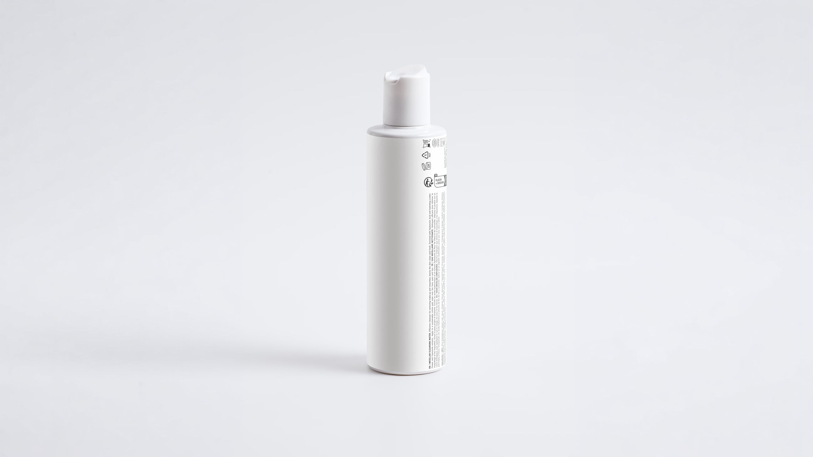 BARE micellar cleansing water slim white bottle, side profile view