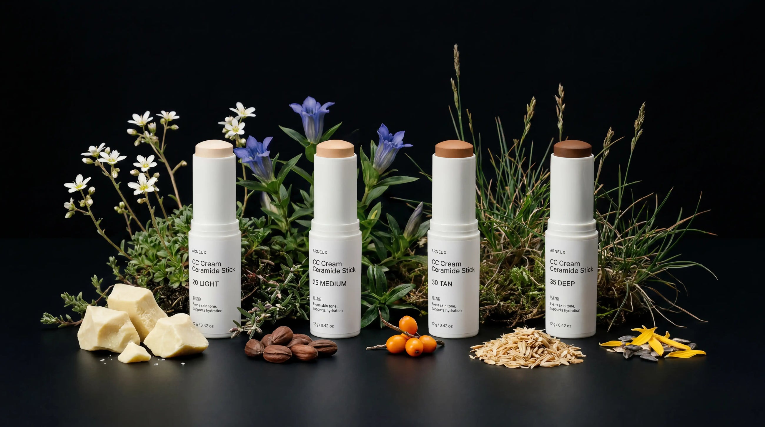 All four BLEND ceramide stick shades with cocoa butter, cacao, sea buckthorn and other ingredients on black