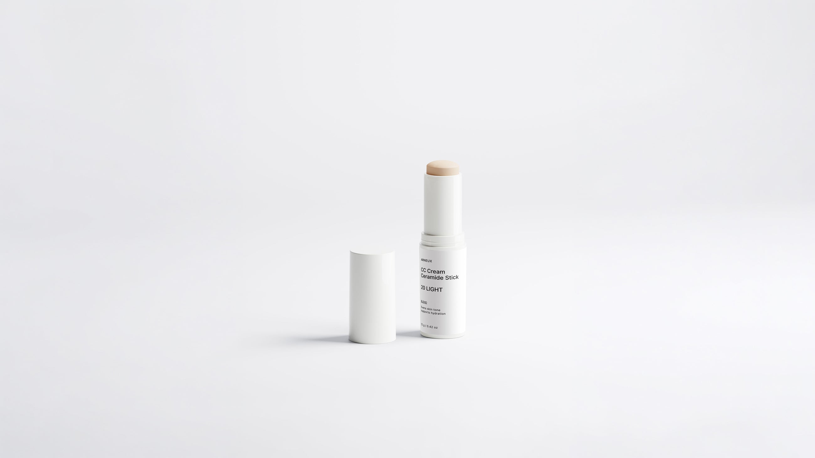 Arneux BLEND CC cream ceramide stick shade 20 Light extended with cap on grey background