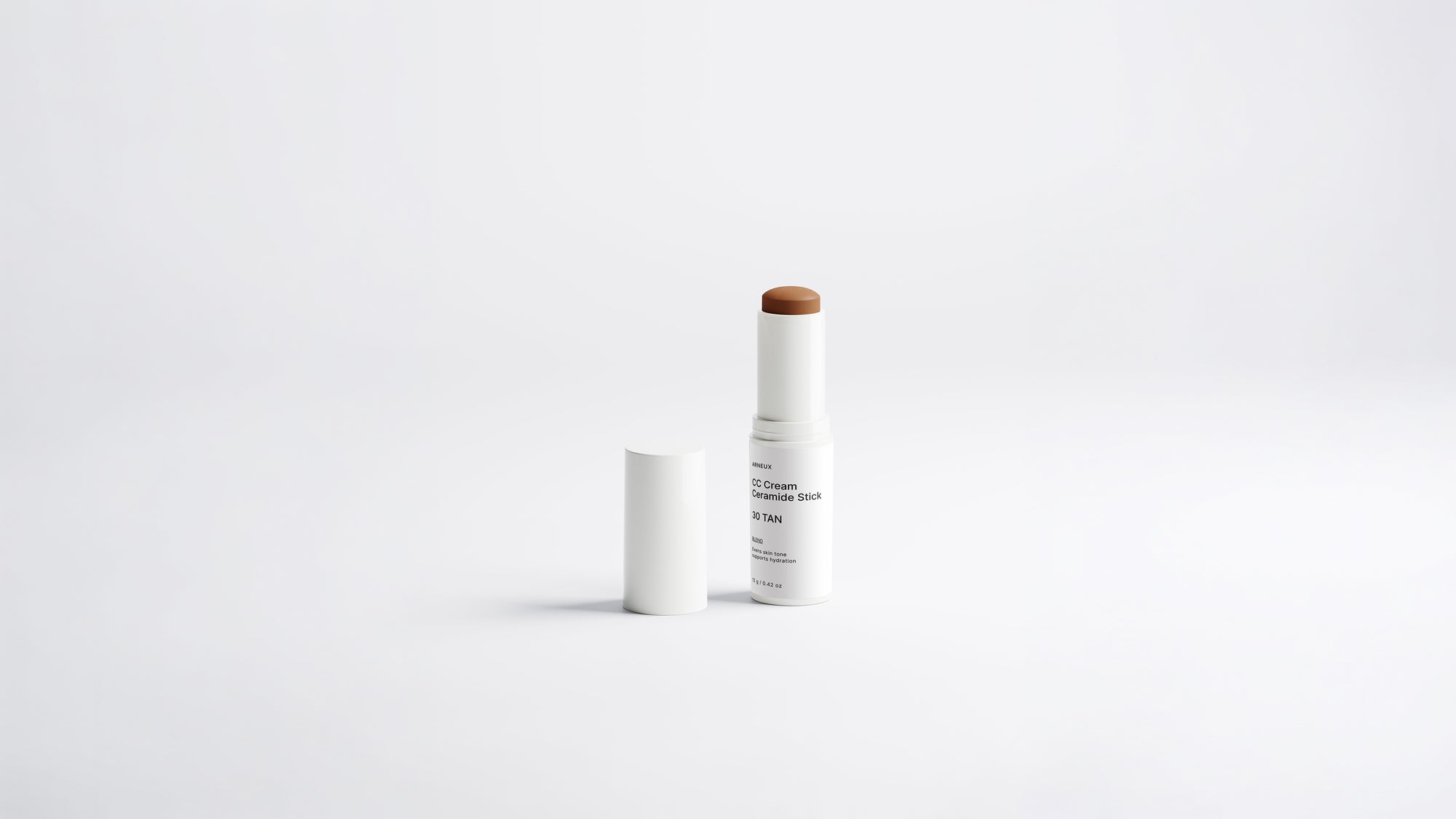 BLEND CC cream ceramide stick shade 30 Tan uncapped on white