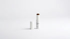 BLEND CC cream ceramide stick shade 35 Deep extended beside cap on white background
