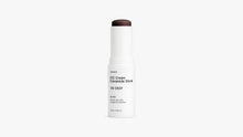 BLEND CC cream ceramide stick shade 35 Deep extended beside cap on white background