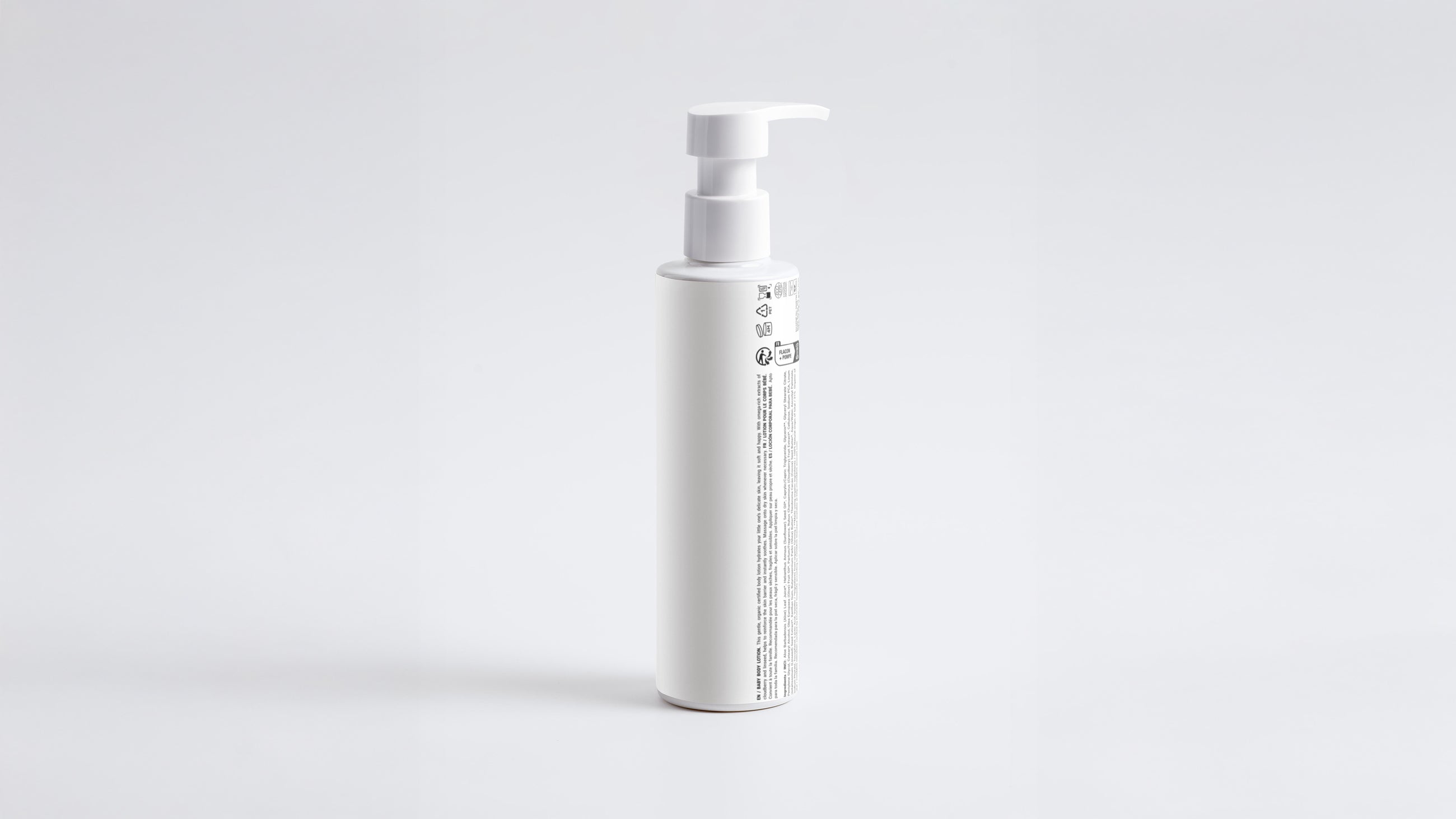 CARE baby body lotion pump bottle back label and side view on white background