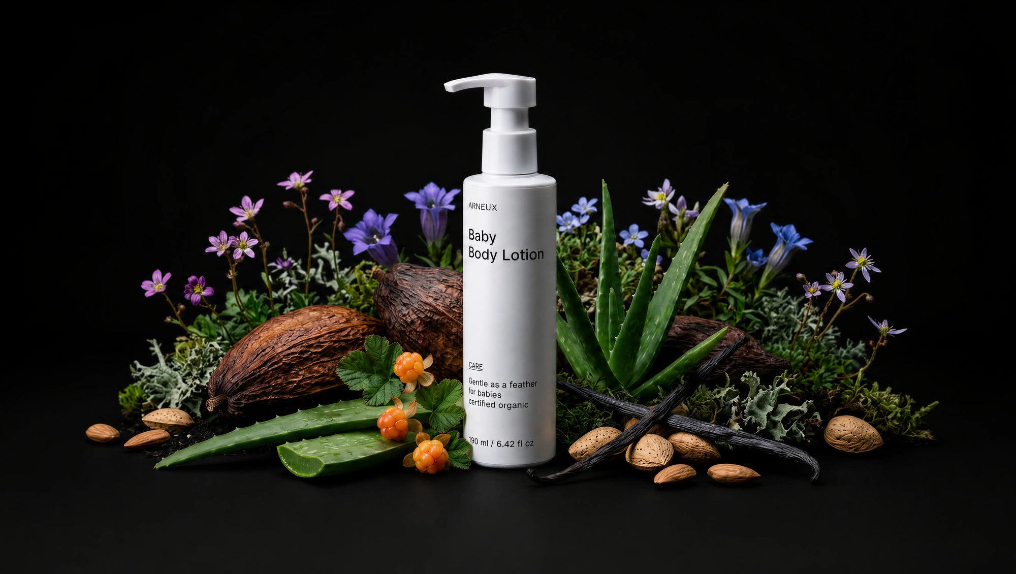 CARE baby body lotion bottle with coconut, aloe vera, purple florals and almonds on black background