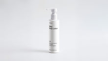 Arneux CARE baby body lotion pump bottle, front label view on light grey background