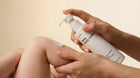 CARE baby body lotion being dispensed onto hands, soft-protected all day formula for dry baby skin