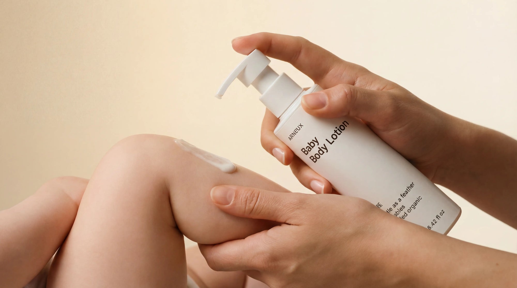CARE baby body lotion being dispensed onto hands, soft-protected all day formula for dry baby skin