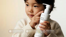 Young boy in cream sweater holding CARE baby body lotion, safe from birth allergen label free callouts