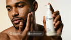 Man massaging CLEAR blemish face wash into skin, pH-balanced formula and calms breakouts callouts
