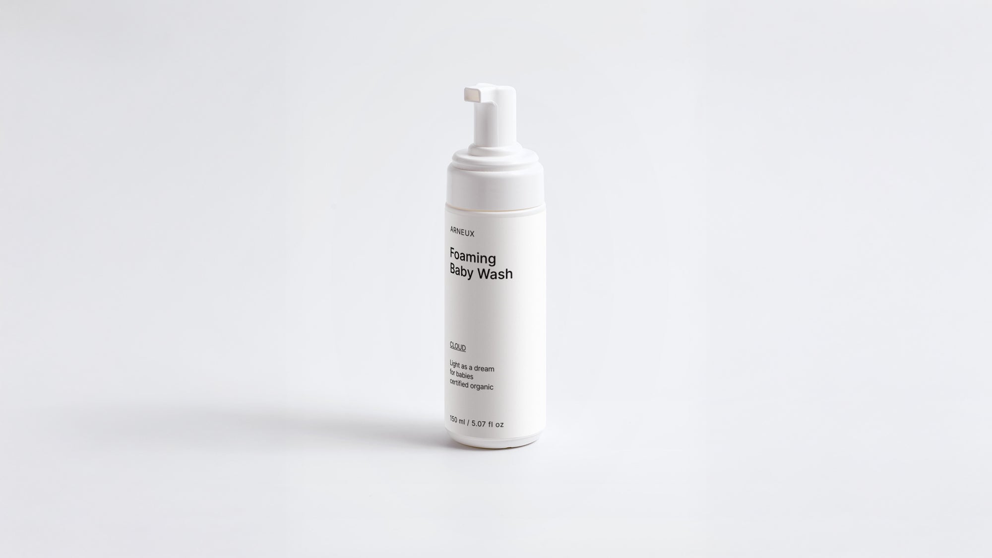 Arneux CLOUD foaming baby wash foam pump bottle, front label view on light grey background