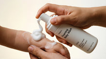 CLOUD foaming baby wash foam applied to baby's arm, COSMOS certified no-rub bath formula for newborns