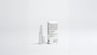 CORRECT dark spot care bottle beside box back panel showing ingredient list