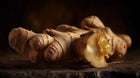 Sliced ginger root close-up, brightening anti-inflammatory ingredient in CORRECT dark spot care