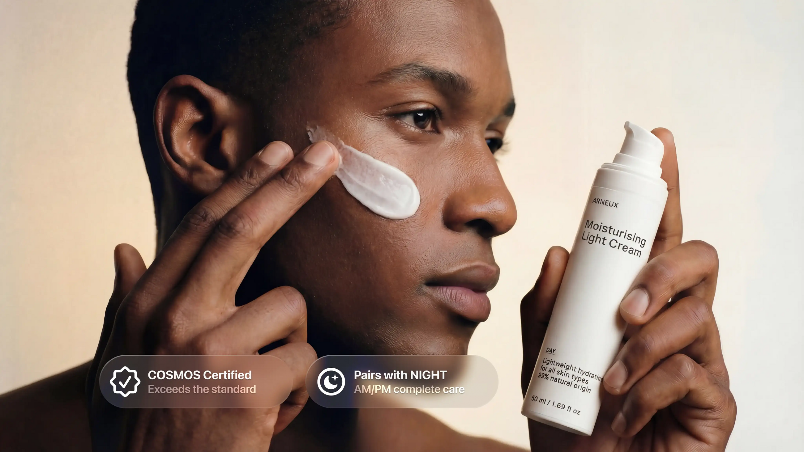 Man applying DAY moisturizing light cream to cheek, COSMOS certified pairs with NIGHT callout