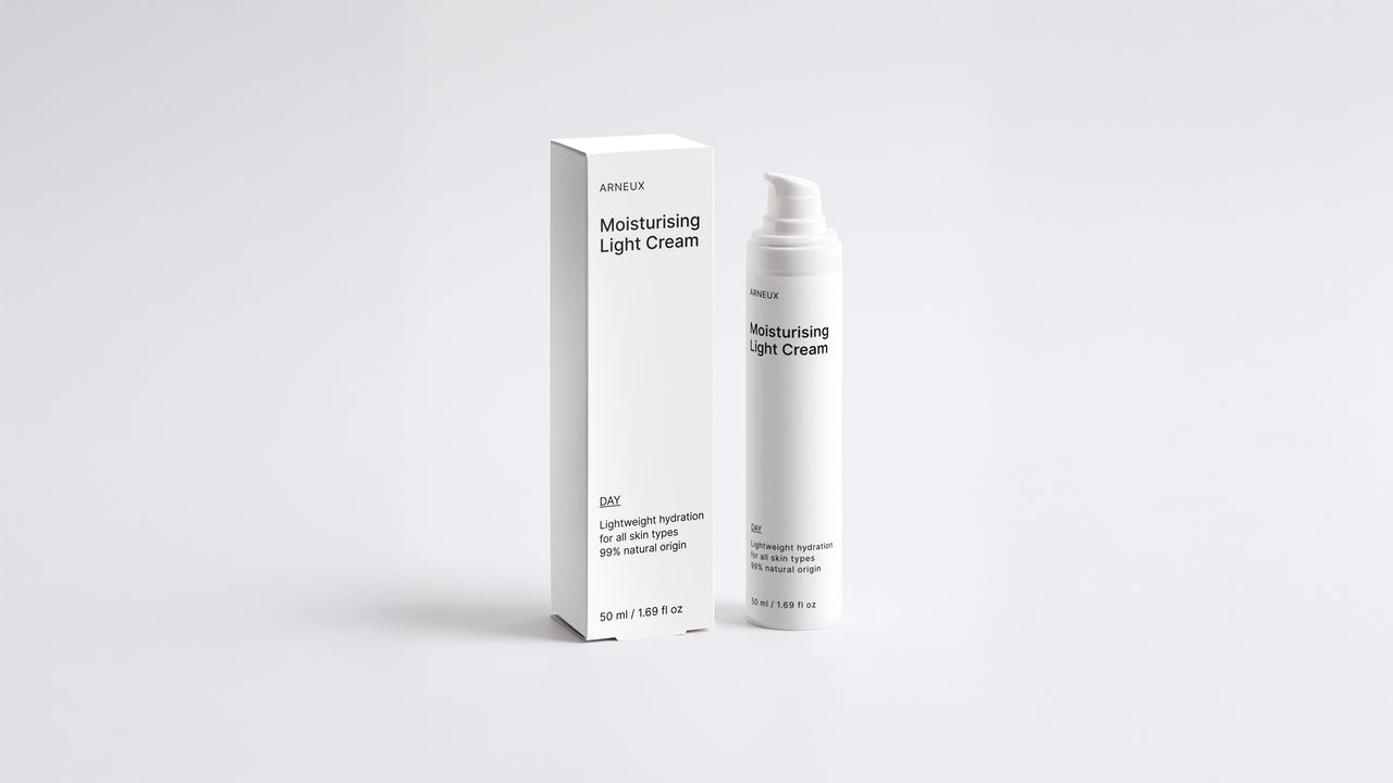 DAY moisturizing light cream bottle and box packaging set on grey background