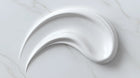 Moisturizing light cream smooth white texture swatch on marble, fast-absorbing matte finish consistency