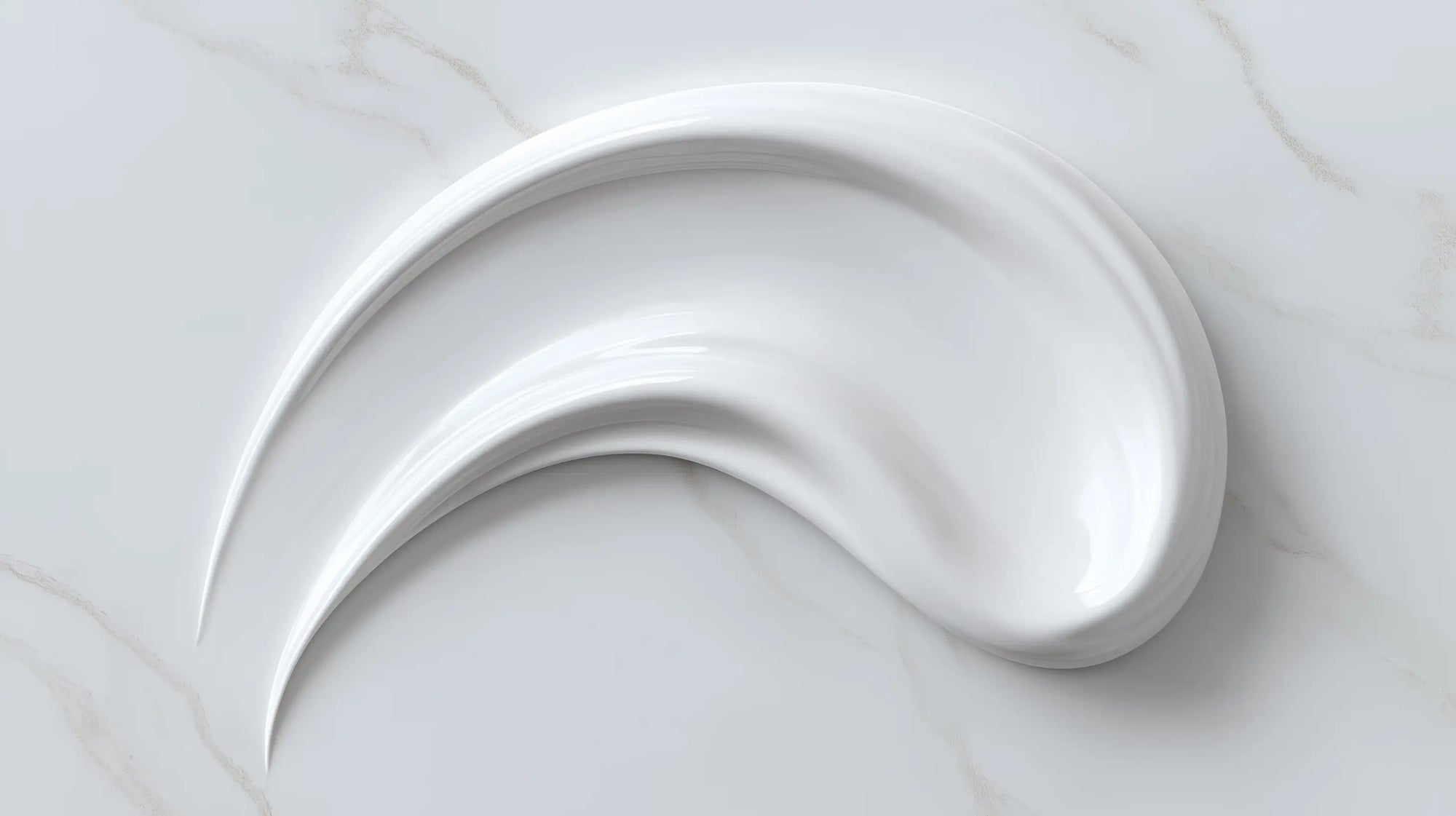 Moisturizing light cream smooth white texture swatch on marble, fast-absorbing matte finish consistency
