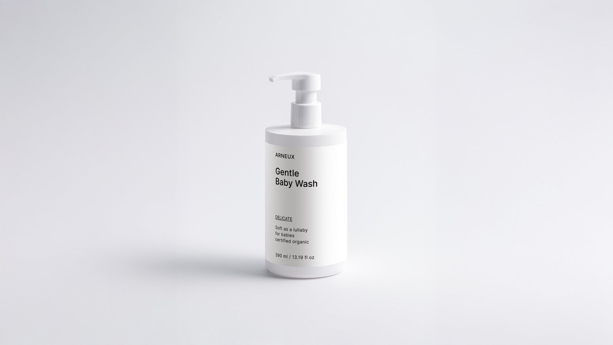Arneux DELICATE gentle baby wash pump bottle, front label view on light grey background
