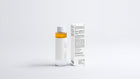 DISSOLVE biphasic makeup remover bottle beside box, side view showing back label text