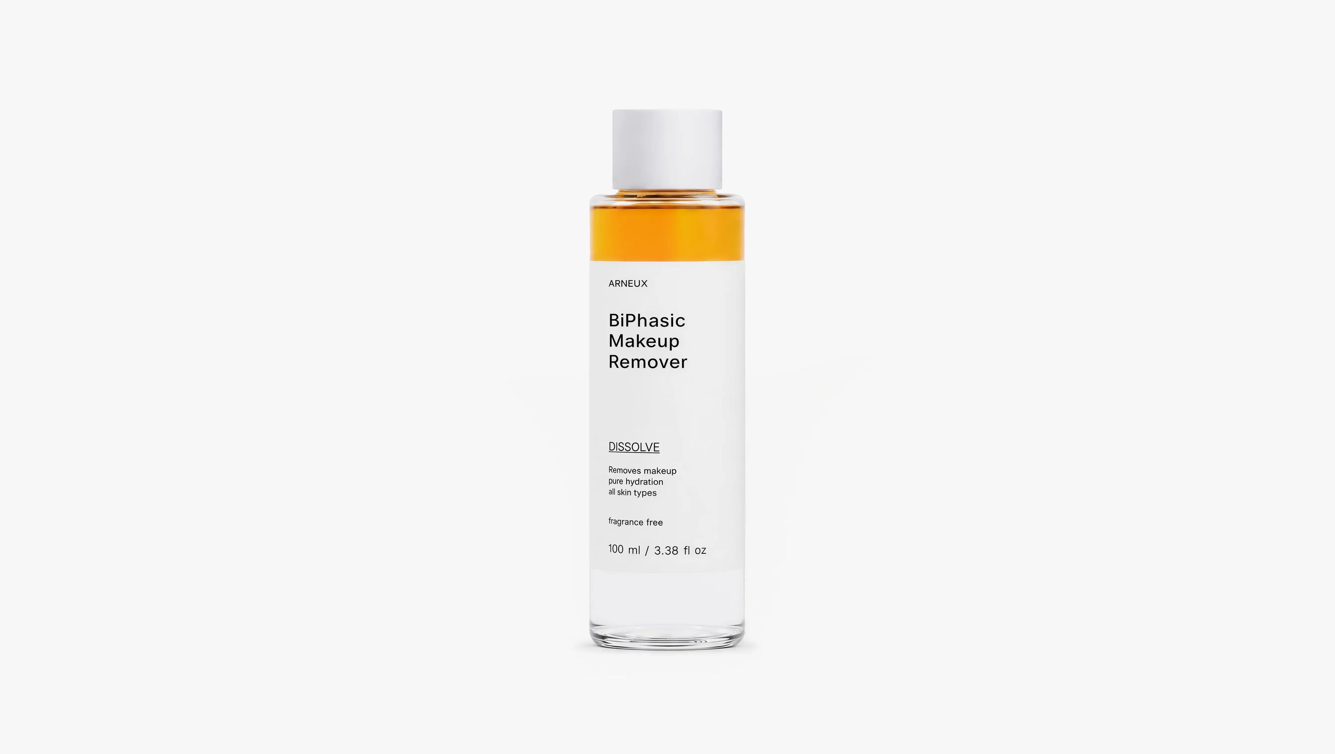 Arneux DISSOLVE biphasic makeup remover bottle showing amber dual-phase formula, front label