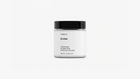 Arneux EMBER travel candle glass jar with black lid, sweet heather soy wax candle front view on grey background