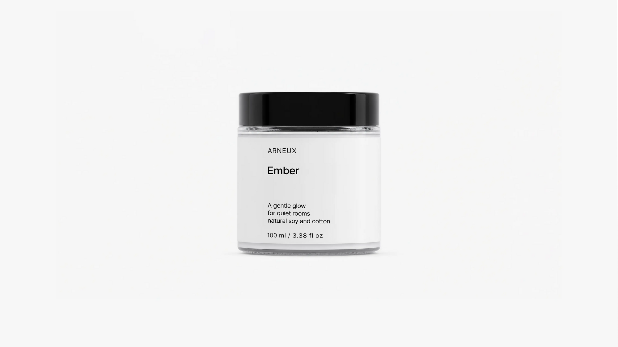 Arneux EMBER travel candle glass jar with black lid, sweet heather soy wax candle front view on grey background