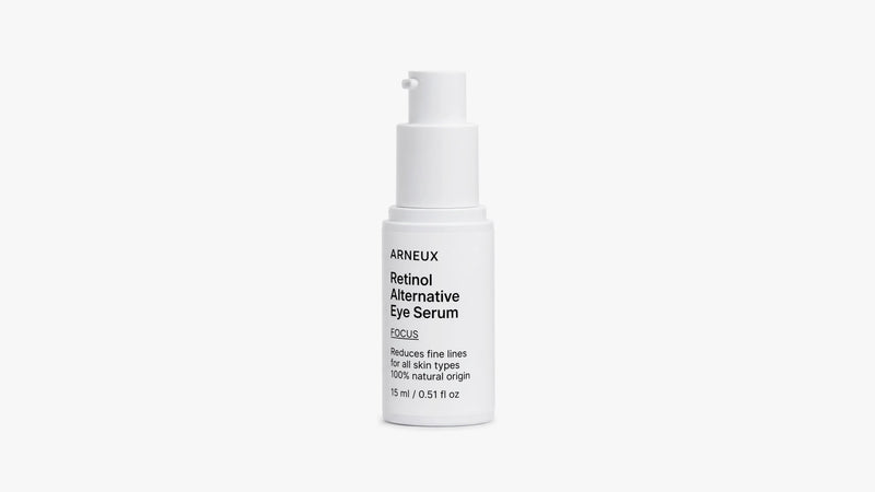 A white pump bottle of ARNEUX Retinol Alternative Eye Serum with black text, centered on a clean white background.