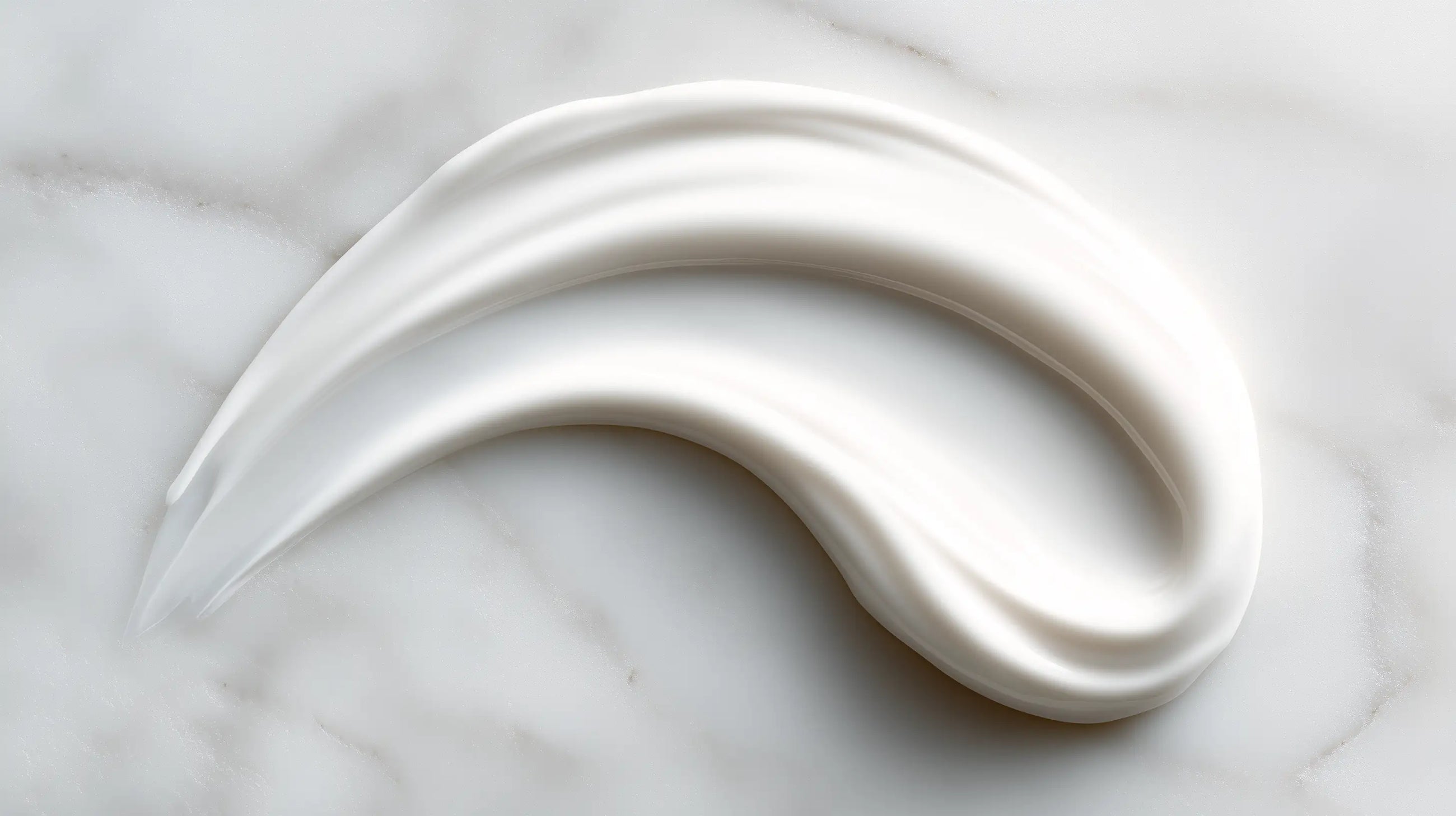 Retinol alternative serum smooth white texture swatch on marble, lightweight non-irritating consistency